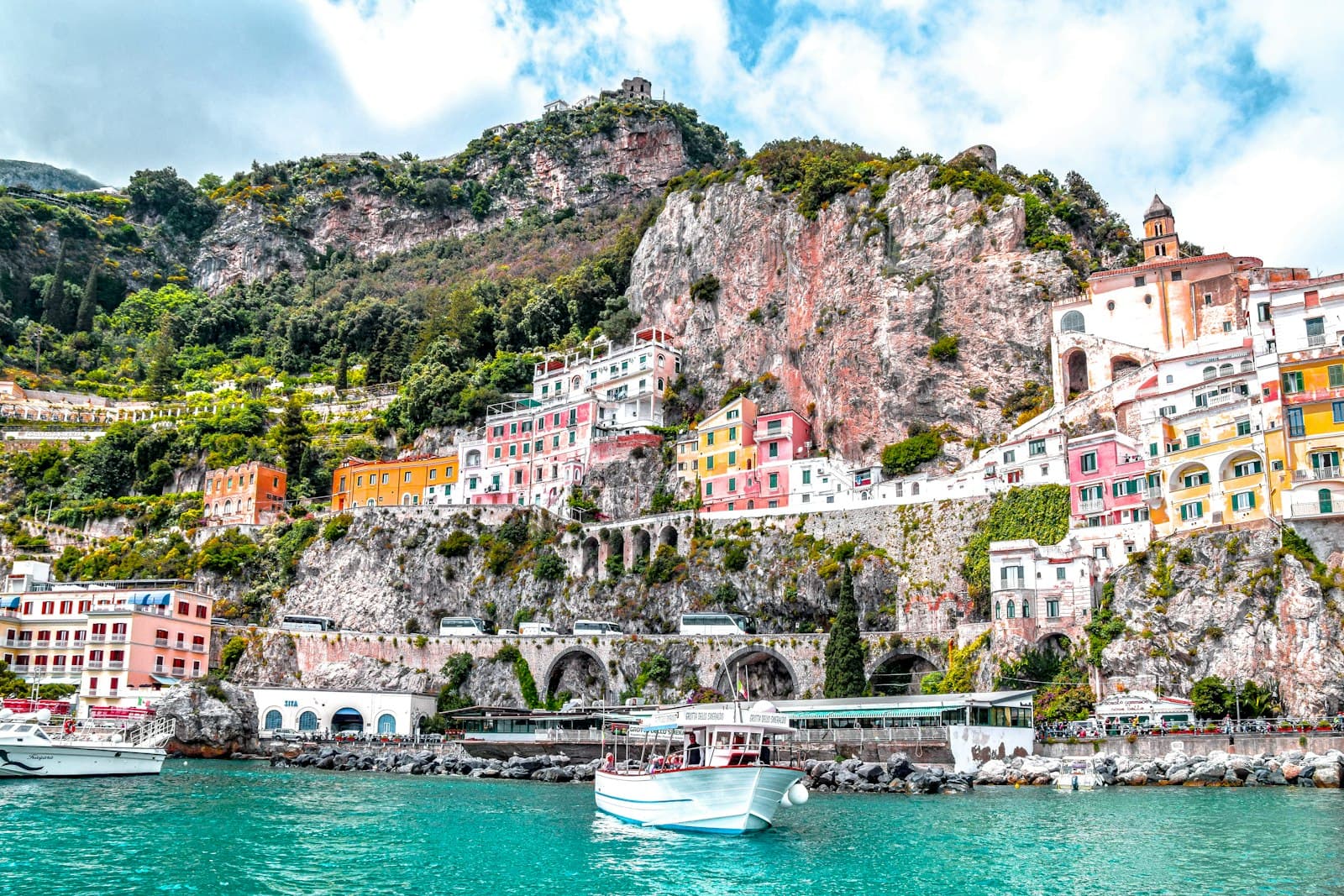 Dramatic coastal cliffs, pastel villages, and the finest seafood on the Mediterranean.